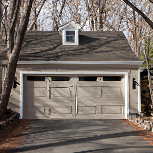 Suburban Medfield driveway showing a closed residential garage door on a New England-style house in soft morning light.