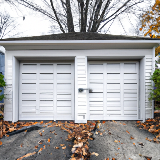 Suburban Medfield house with a closed two-car garage door, autumn leaves on the driveway, overcast sky.